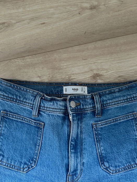блакитні джинси кльош mango