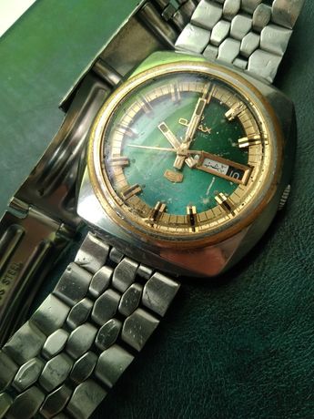 Швейцарские часы Omax зелёный циферблат позолоченные обмен