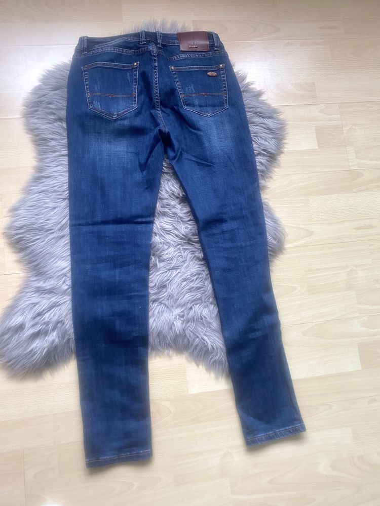 Spodnie jeansy Resalsa z ozdobnymi przetarciami roz.30 (M/L)