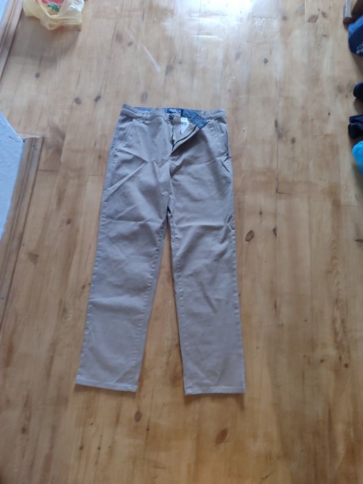 Продам штани з бірками
