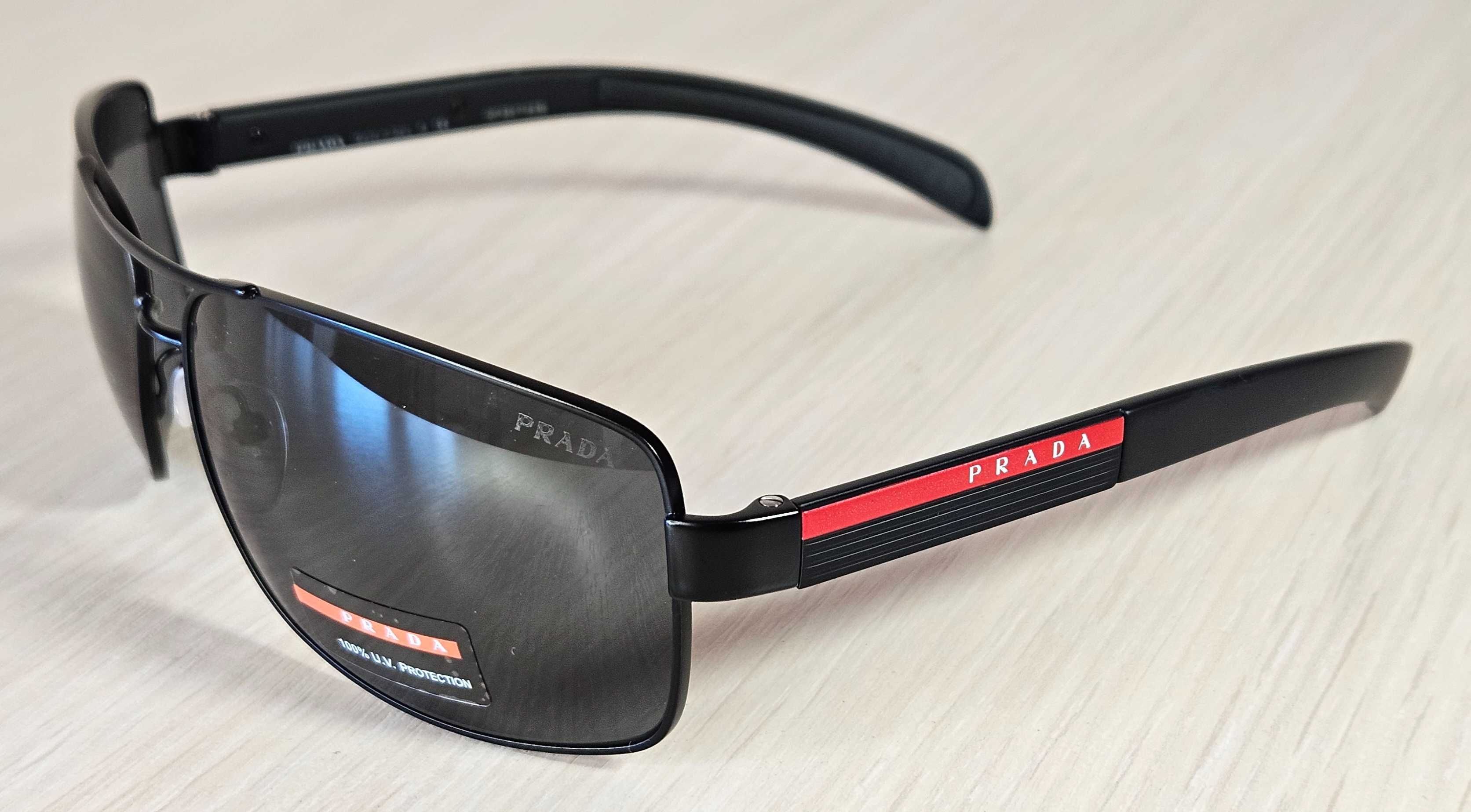 PRADA. Сонцезахисні окуляри PRADA SPS 54I 1BO-1A1 65 мм.