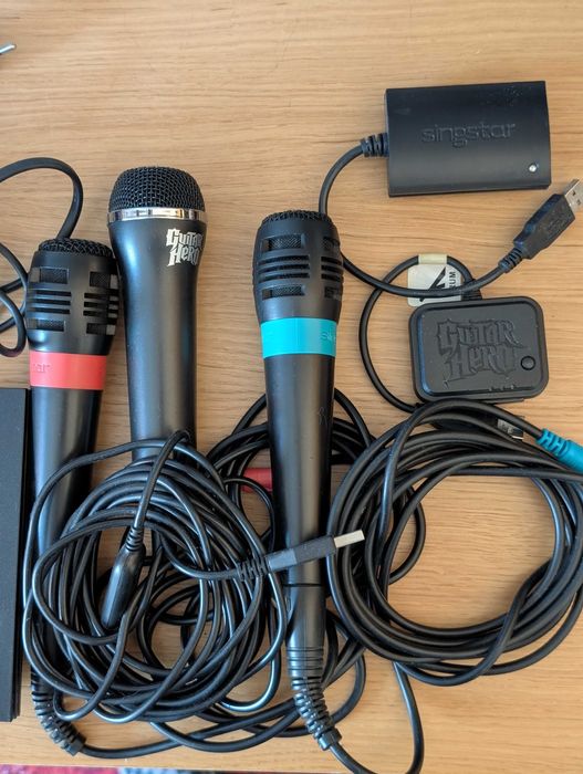 PS 2 Slim+Comandos+Microfones+Comandos Buzz+Cartões Memória+20 Jogos