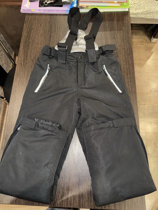 Продам зимний комбинезон штаны на мальчика