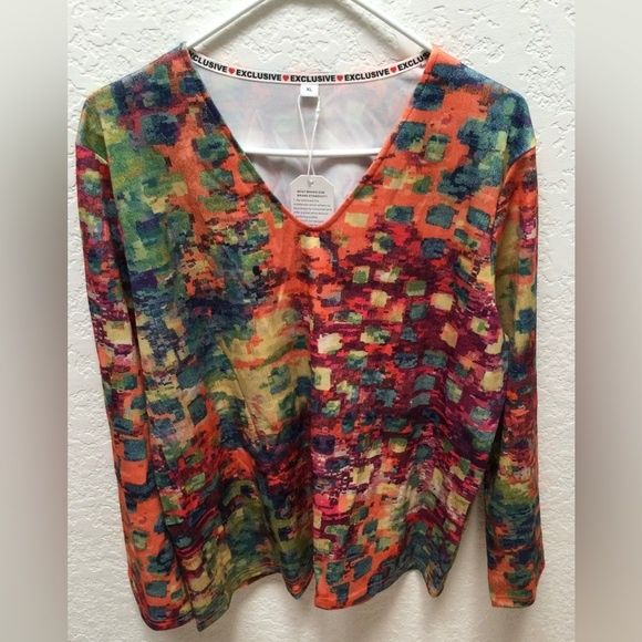 Подарую нову блузку