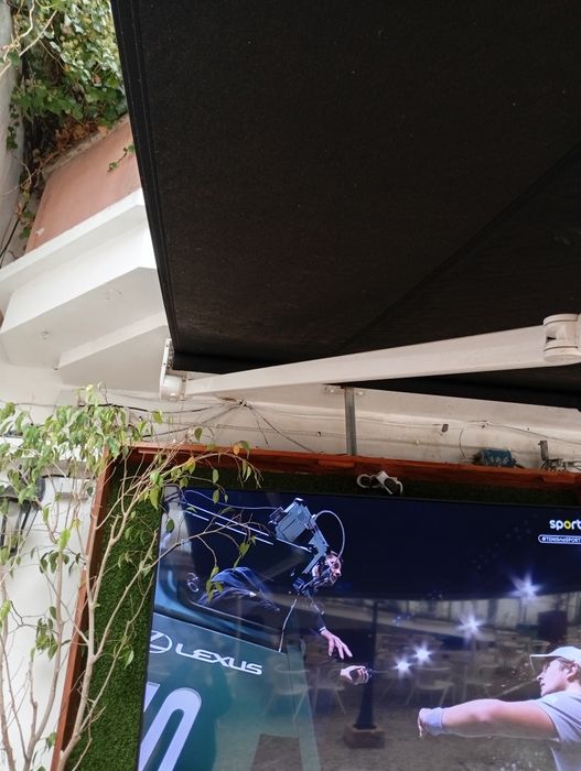 Vendo toldo elétrico com comando como novo 7 metros por 5 metros