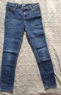Spodnie jeans r. M