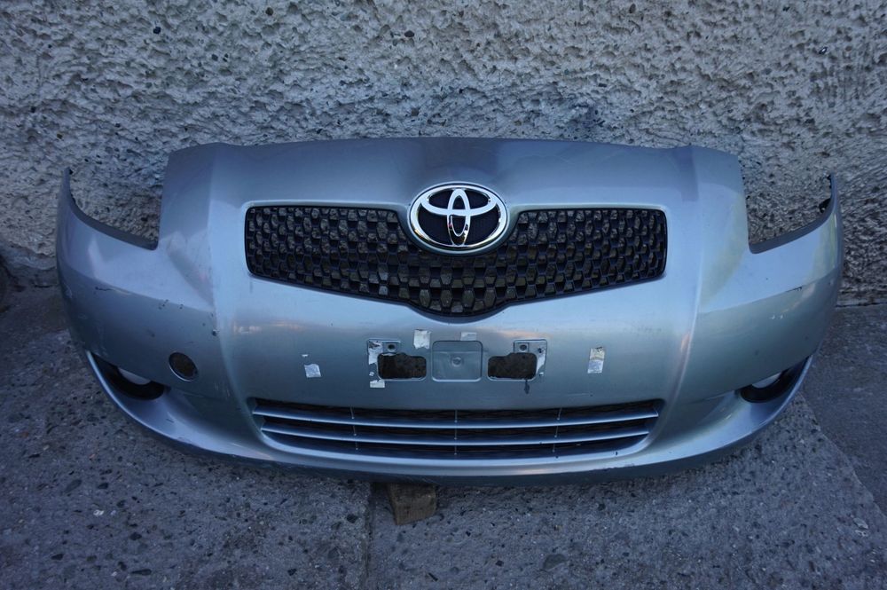 ZDERZAK PRZÓD PRZEDNI TOYOTA YARIS II 05/09r