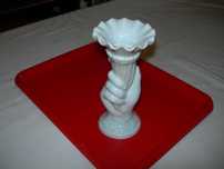 Candelabro de porcelana.