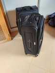 2 large black suitcases.