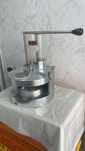 Maquina transformadora de hamburgueres