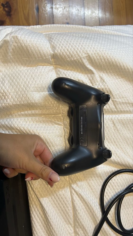 play station 4 e comando