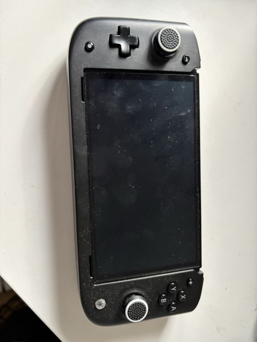 Nintendo Switch OLED + białe Joy-Cony + gry + Nitro Deck