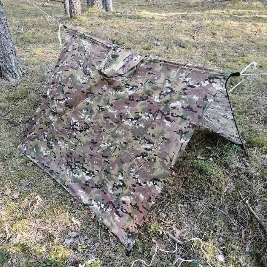 Дощовик-пончо, виконаний з міцної та легкої тканини