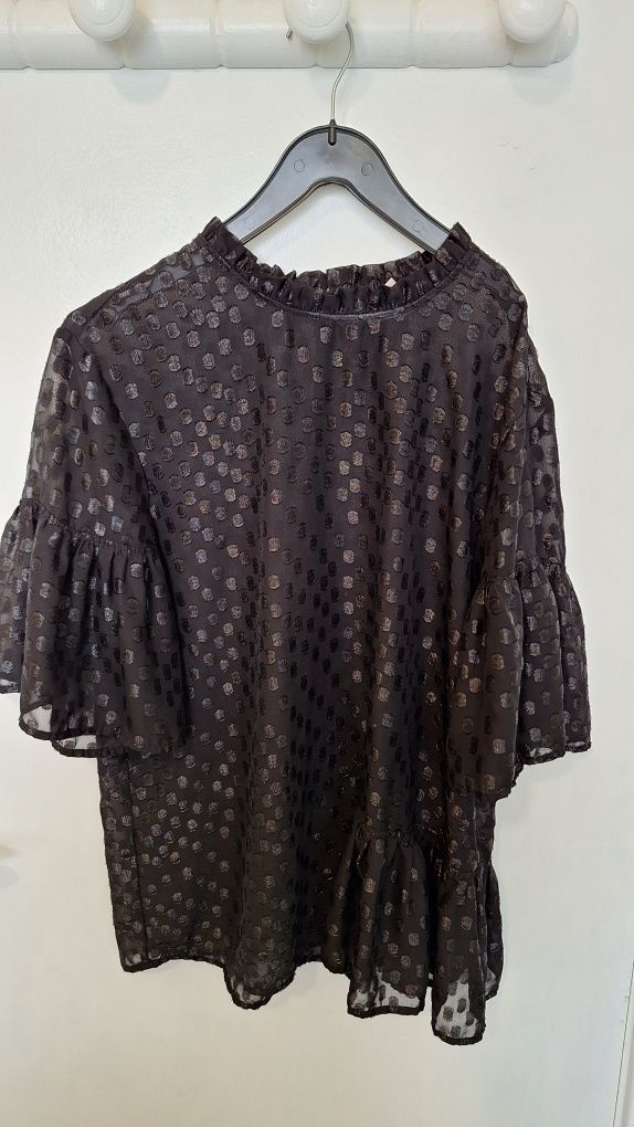 Blusa com detalhes