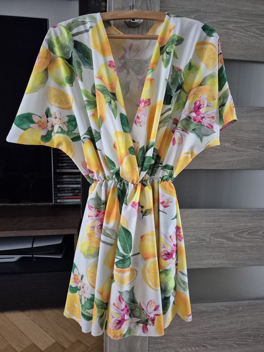 Przepiękny letni kombinezon ala sukienka z przekładanym dekoltem