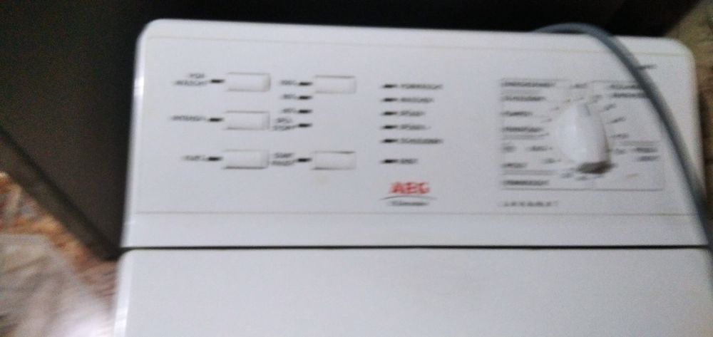 Вертикальна пральна машина