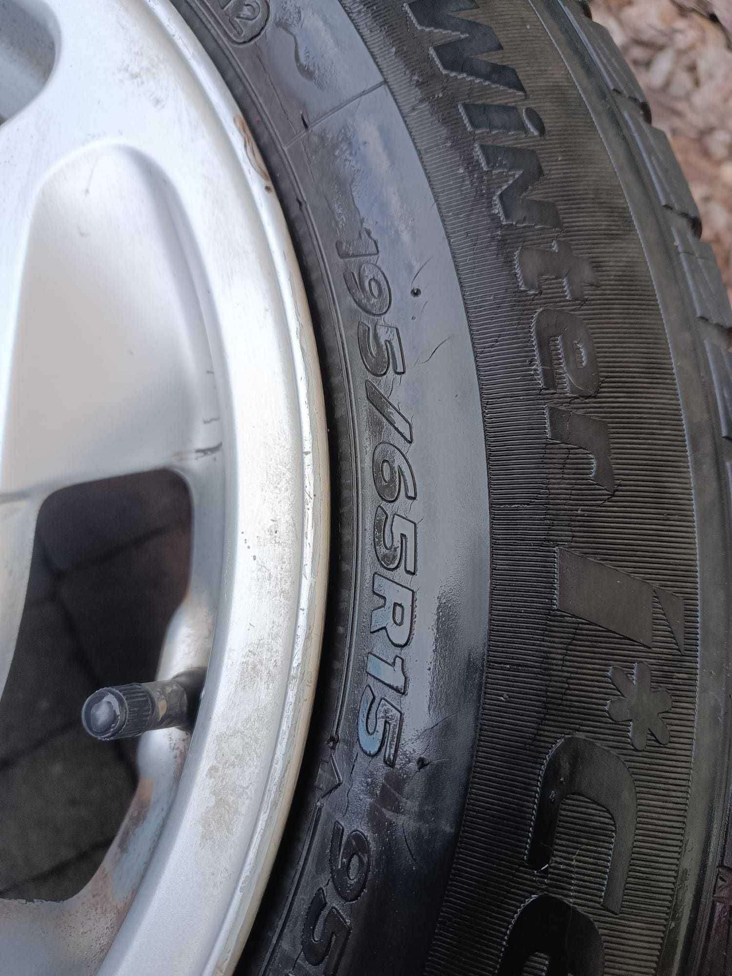 Oryginalne felgi +opony Hankook zimowe do Mercedesa "15"