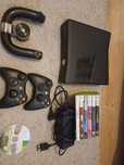Xbox 360 + 34 gry + 2 pady + kierownica + zasilacz