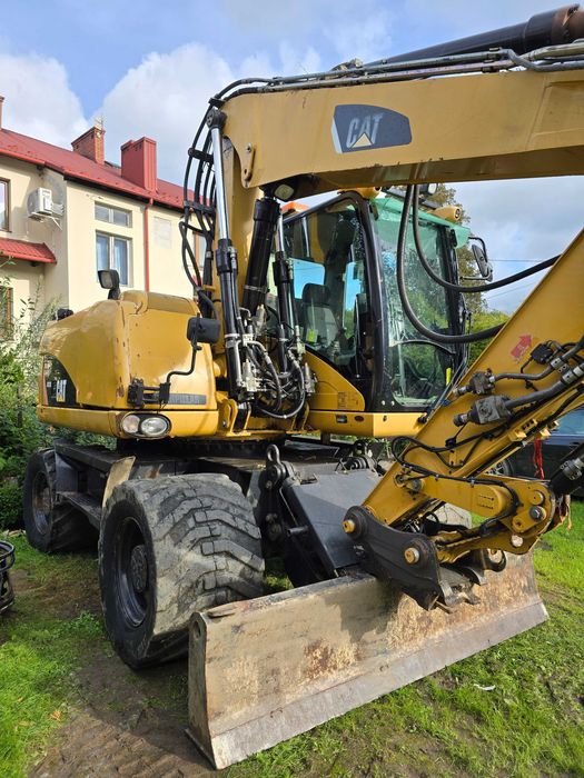 Sprzedam koparke kołową catepillar 313D