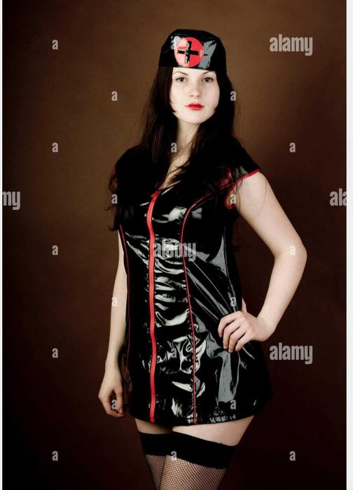 Костюм сексуальної медсестри чорного кольору Leg Avenue Naughty S-М