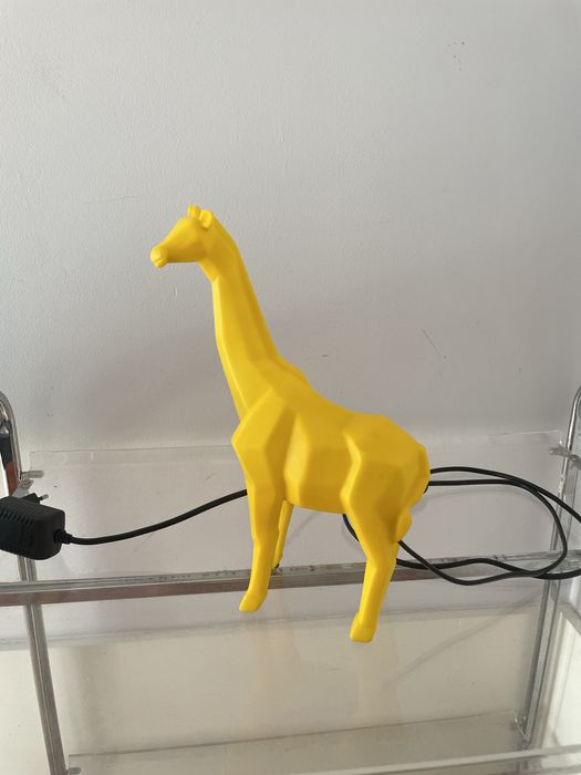Lâmpada em forma de girafa