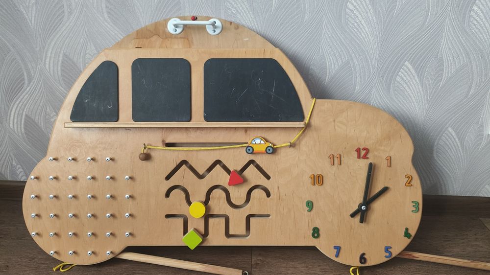 Бізіборд, іграшка для розвитку дитини