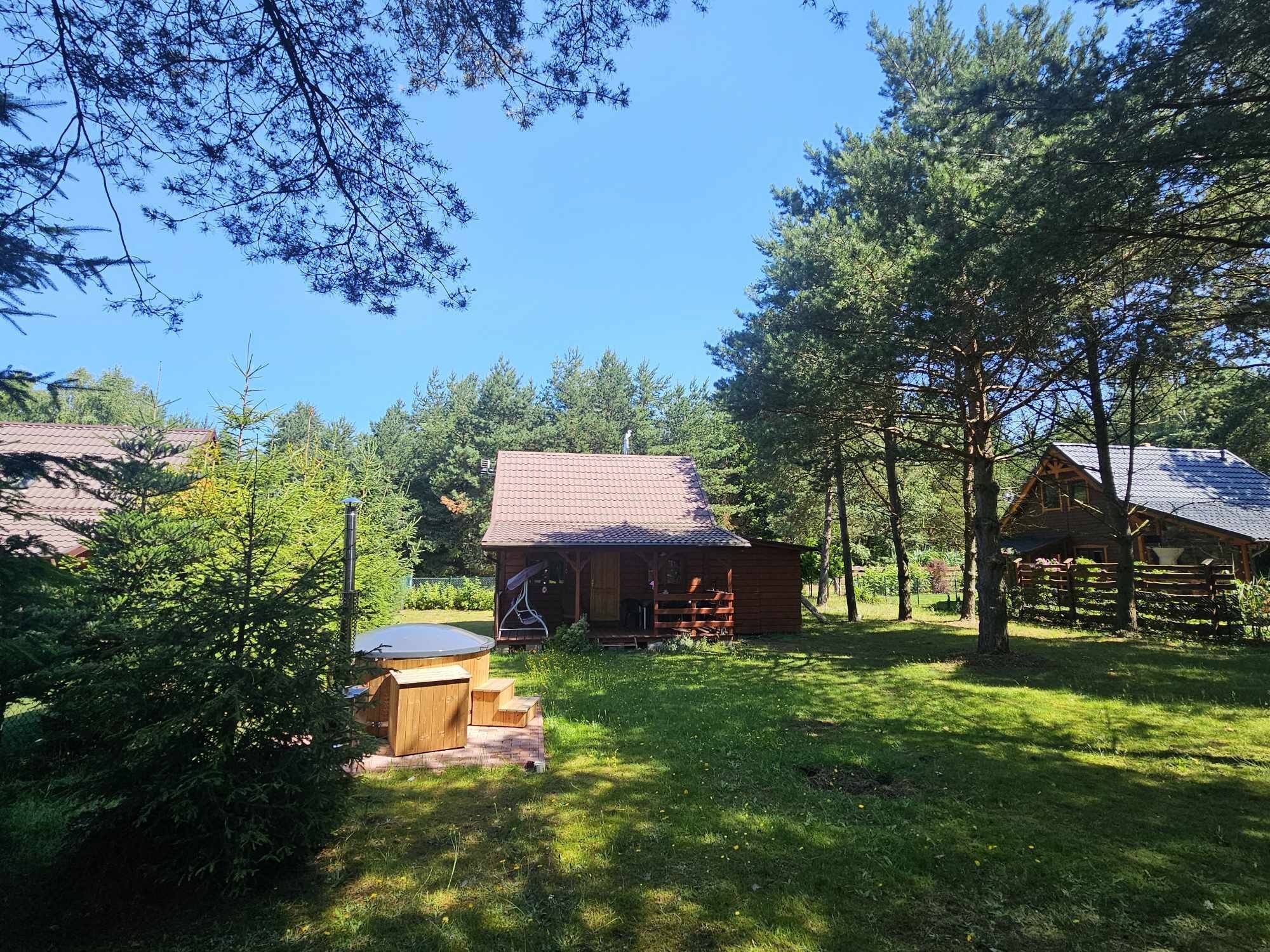 Domek z balią jacuzzi nad jeziorem wolne terminy