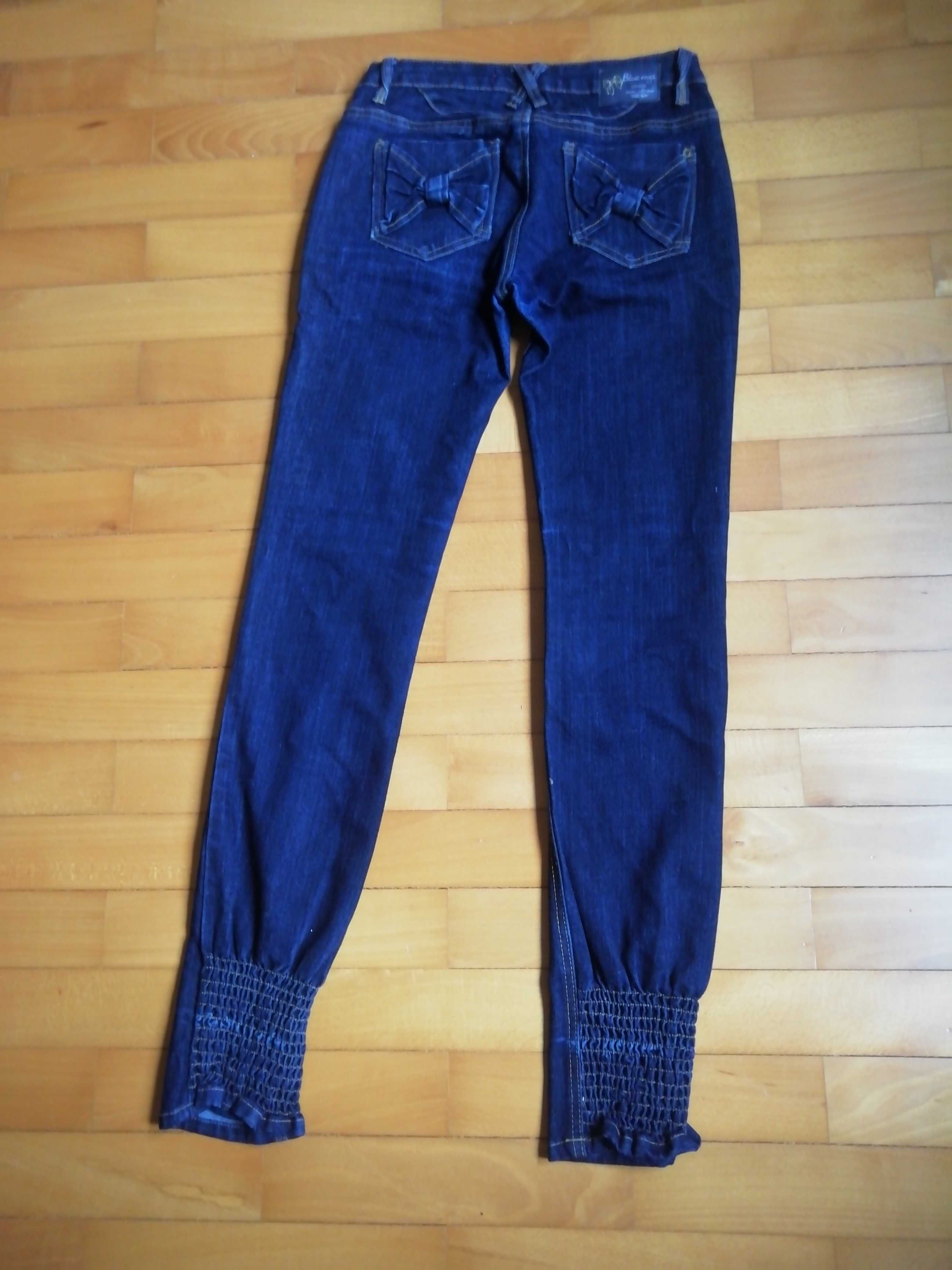 Damskie spodnie jeansowe Blue Rags ze ściągaczami rozm. 38