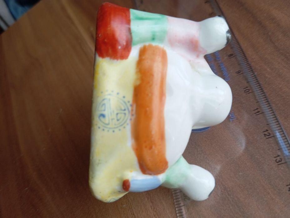 Buda de fertilidade em porcelana