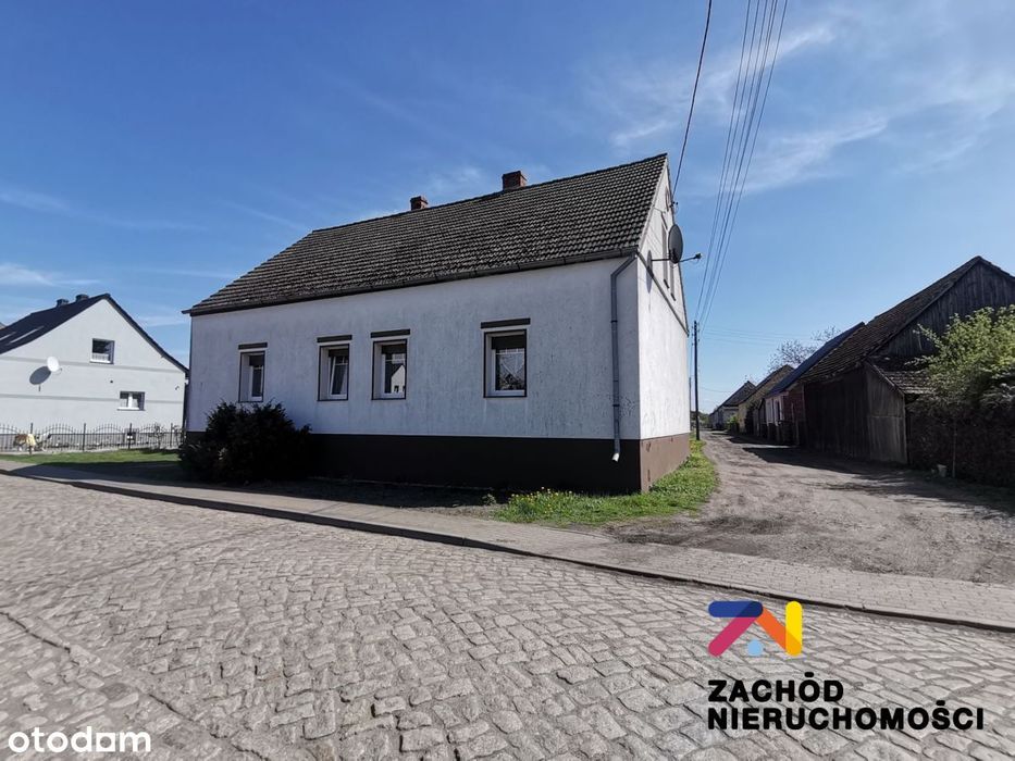 Dom z zabudowaniami - PoŁęcko