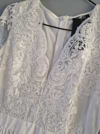 biała suknia ślubna