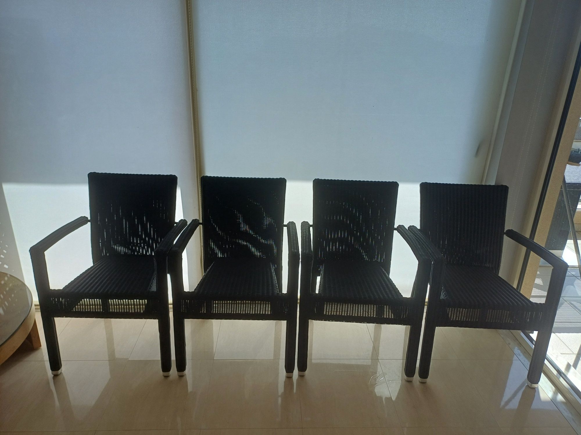 Indoor/Outdoor black rattan table and 4 chairs