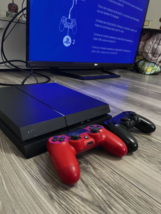 PlayStation 4 (PS4) 1TB + 2 pady + zestaw gier + okablowanie