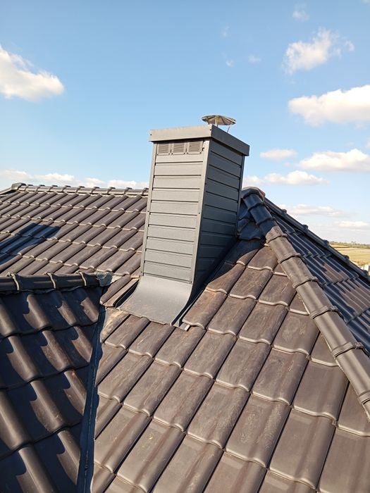 Okucia opierzenie komina , obróbki blacharskie ,