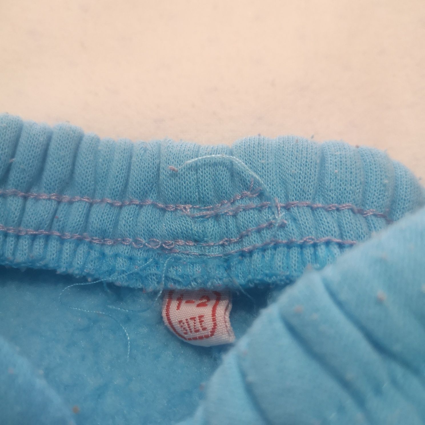 Calça de algodão com algum borboto (1-2 anos)