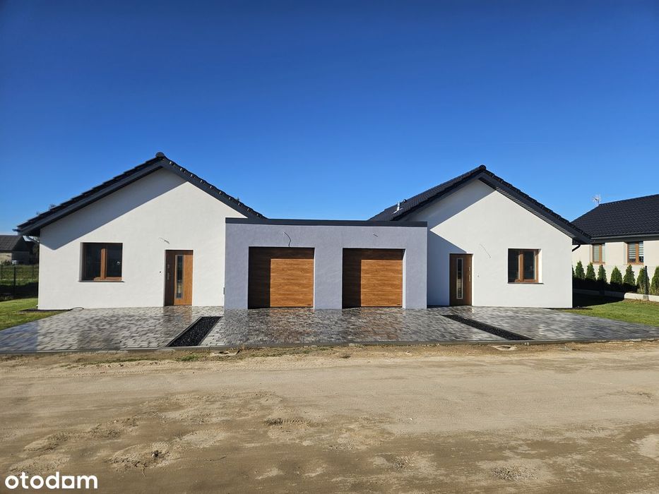Dom PARTEROWY jednorodzinny w zabudowie bliźniaczej połączony garażem