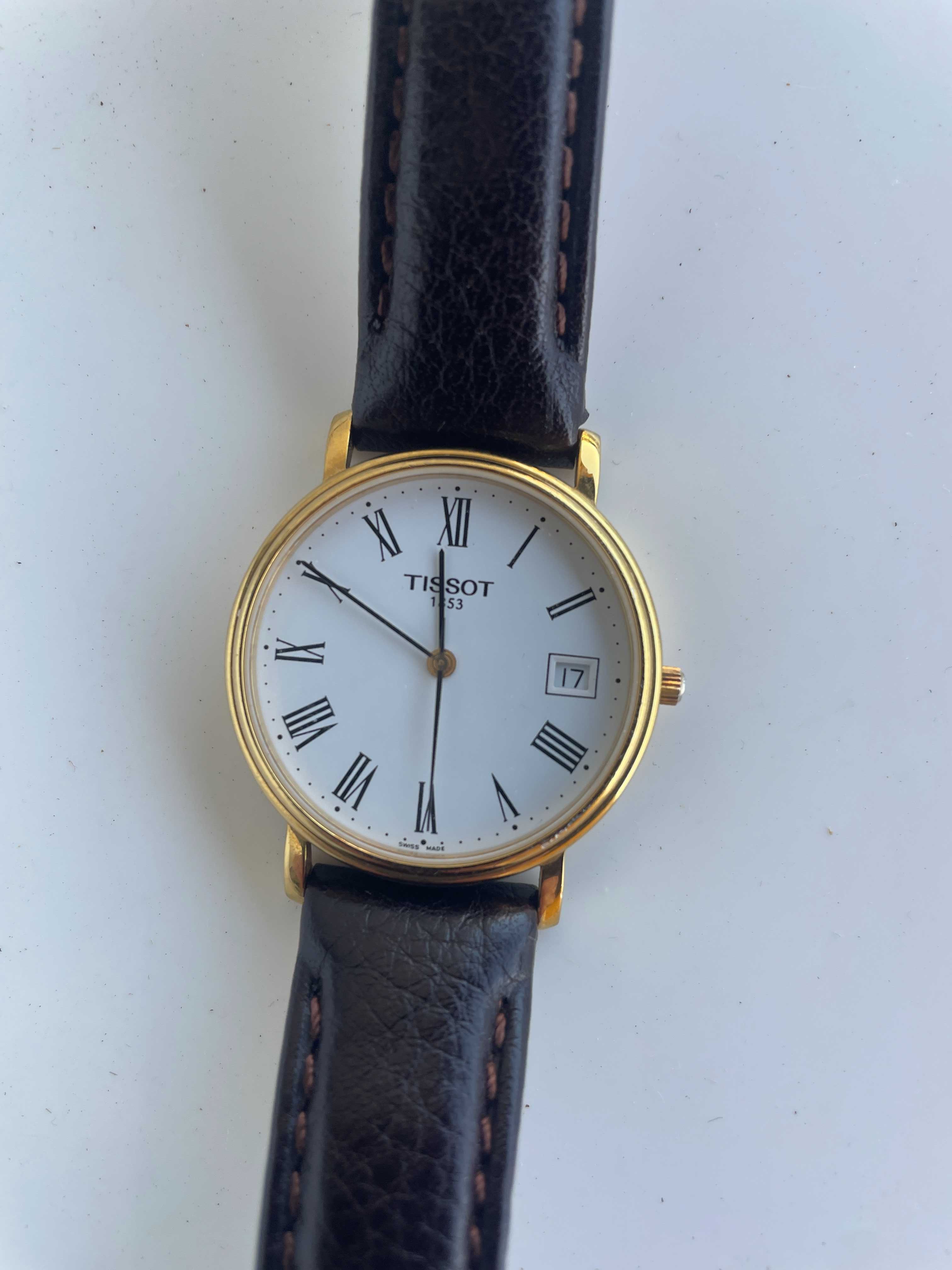 Relógio  Tissot clássico, números romanos
