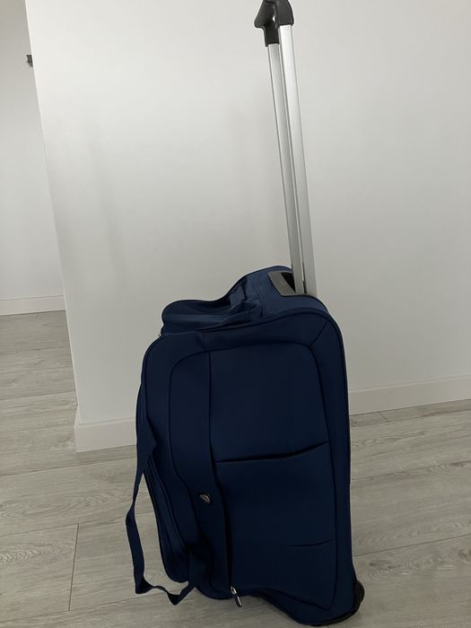 Torba podróżna na kolkach z wysowana rączką