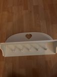 Cabide Zara Home com detalhe de coraçao