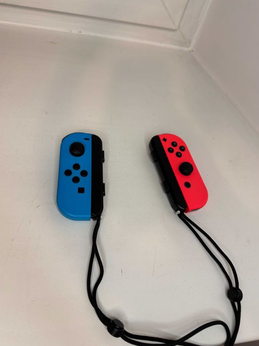 Joy con Nintendo switch ORYGINALNE jak nowe + strap pad prawy i lewy