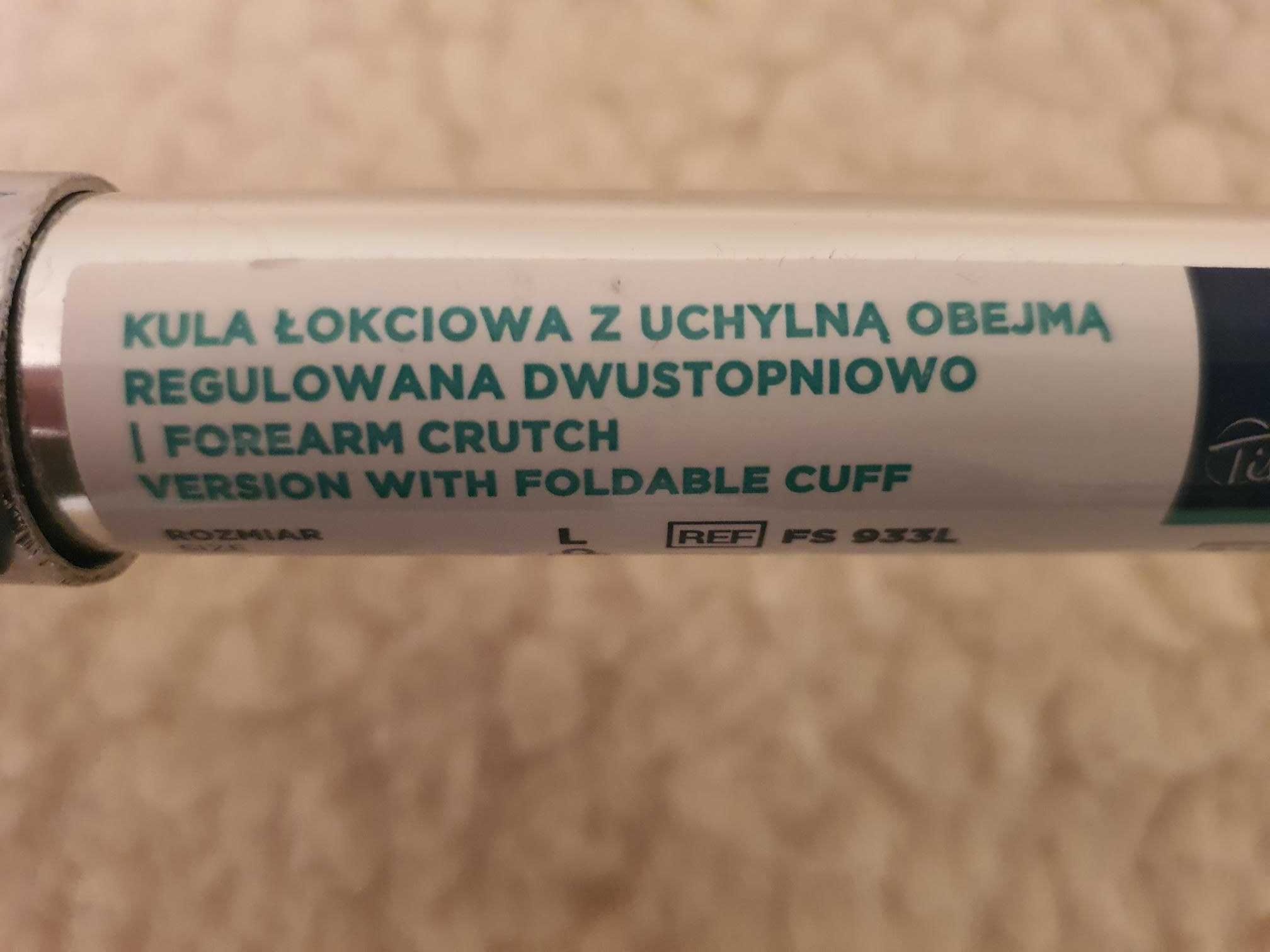 Kula ortopedyczna łokciowa z uchylną obejmą regulowana dwustopniowo.