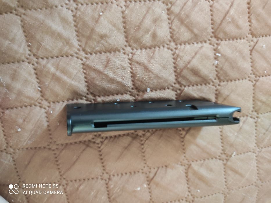 Іграшка пістолет