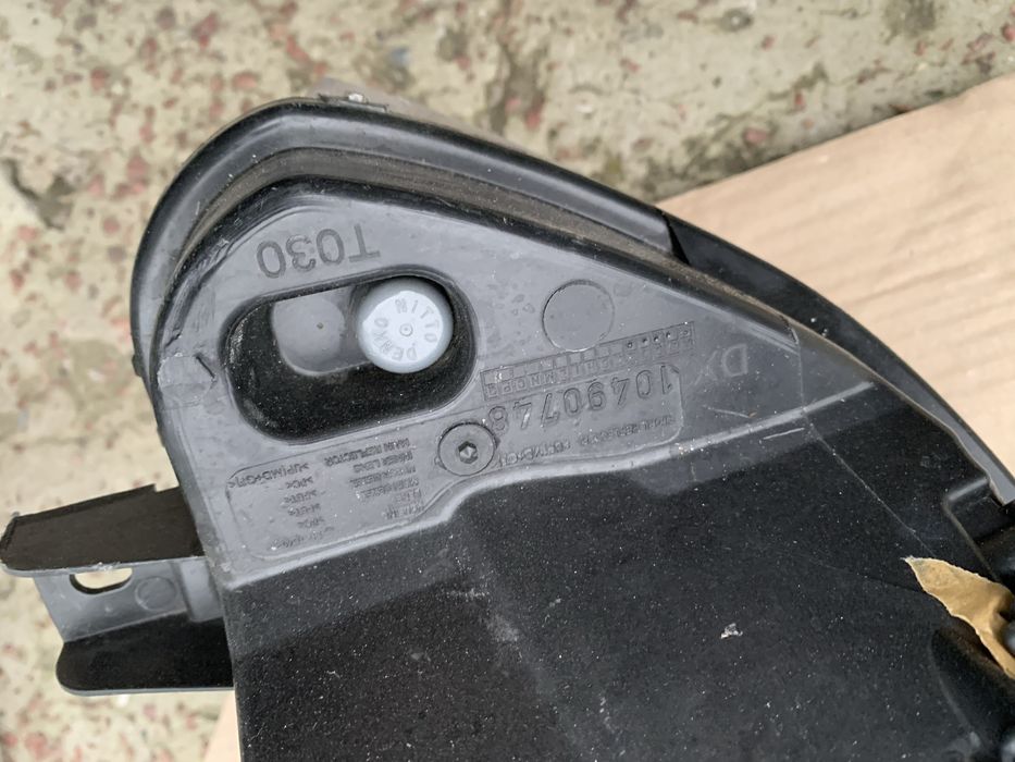 Права фара Fiat Doblo оригінал чорна фіат добло