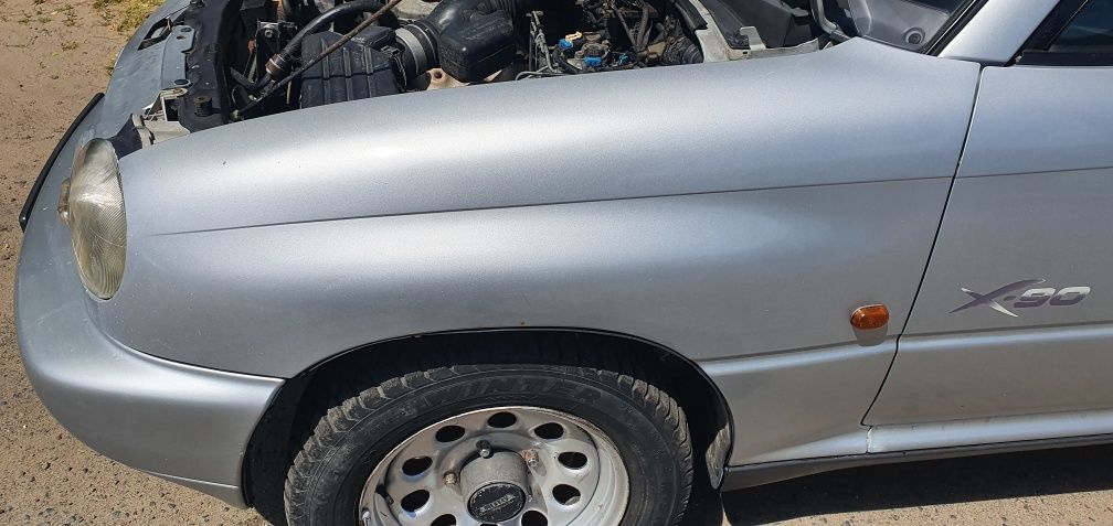 Suzuki Vitara x90 błotnik prawy