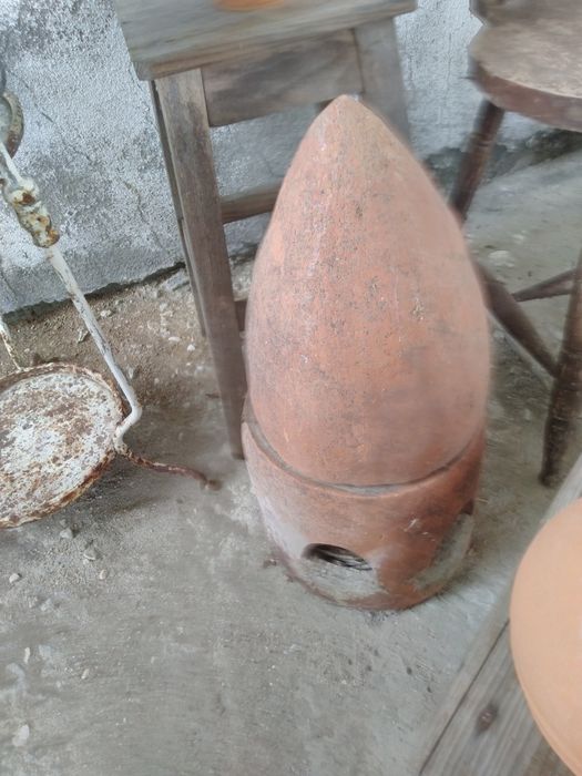 Antigo assador de castanhas.