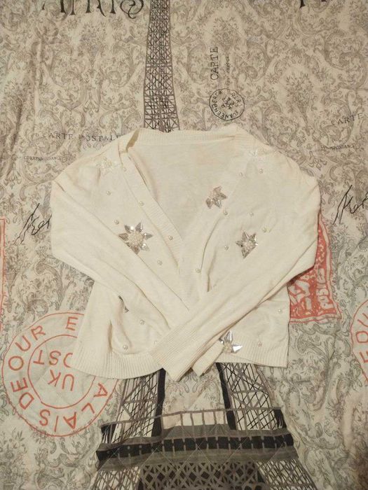 біле болеро с оздобленням