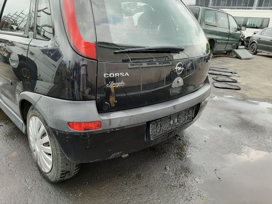 Opel Corsa C 1.2 ,2003 r. Zderzak tylny