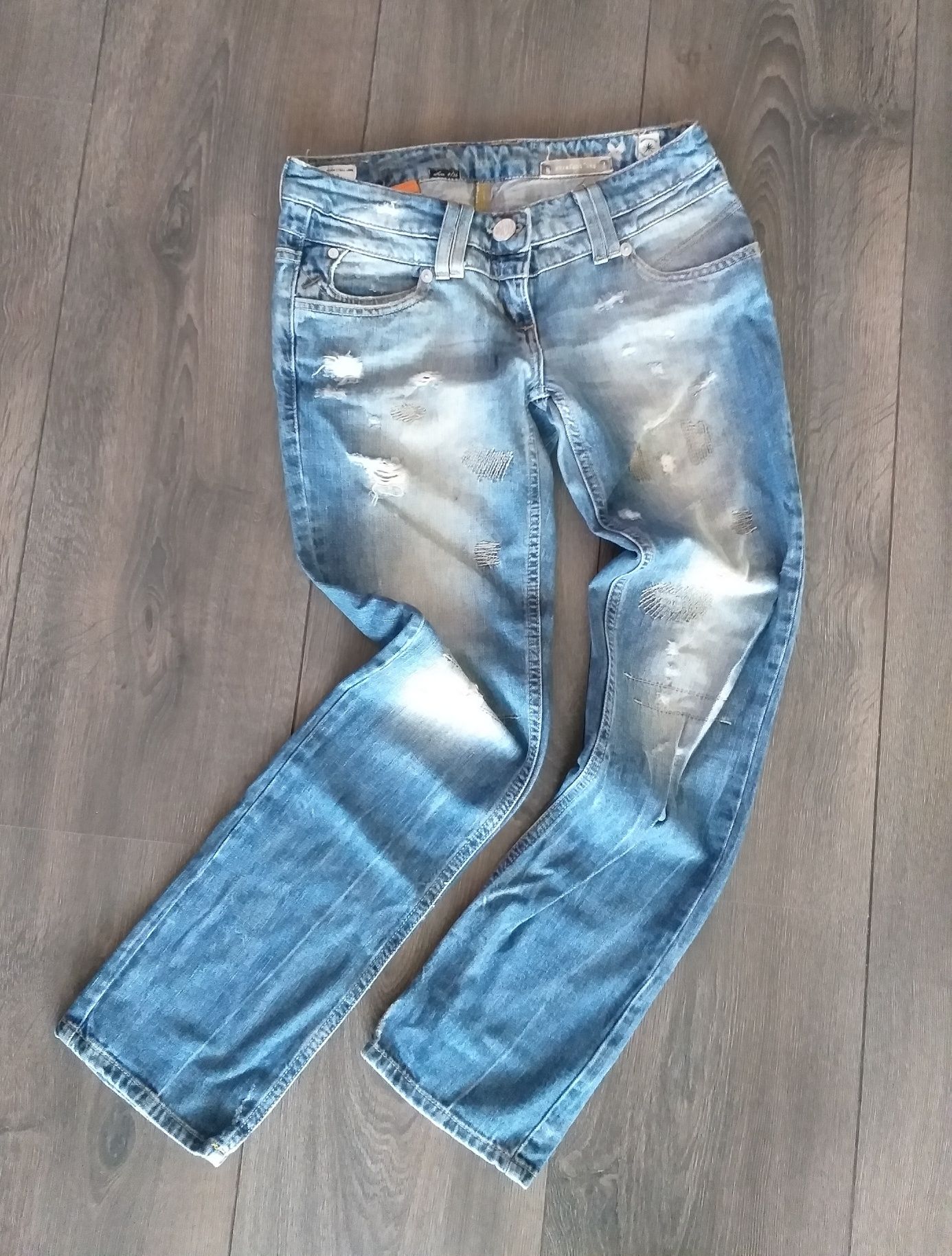 Spodnie River Island jeansy dżinsy przecierane dziury rozdarcia r.  S