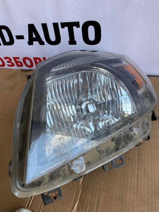Фара передня ліва оригінал FORD RANGER 2009-2012