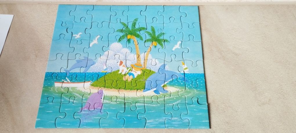 Puzzle 48 elementów Na wyspie delfiny firmy Jigsaw Puzzle - kompletne